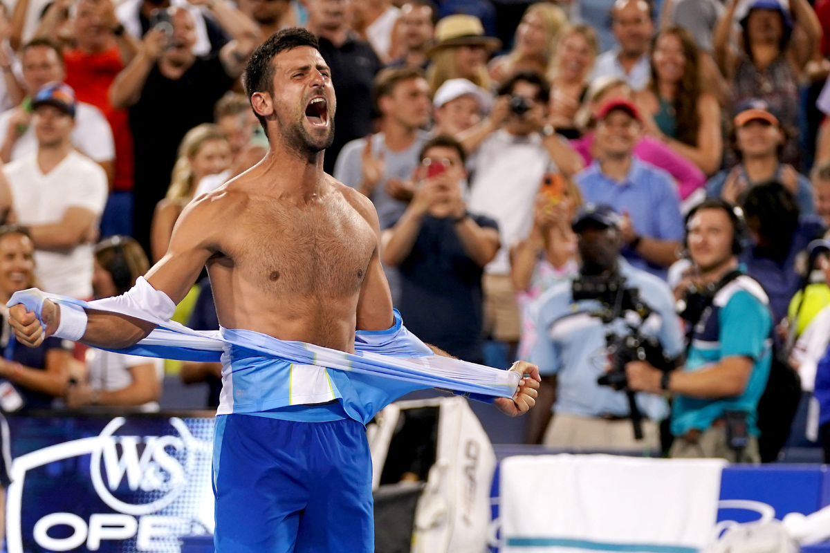 Serbia's Novak Djokovic rips his shirt in celebration after defeating Spain's Carlos Alcaraz to win the men's singles final of the Western & Southern Open tennis tournament at Lindner Family Tennis Center, Cincinnati, in Mason, Ohio.