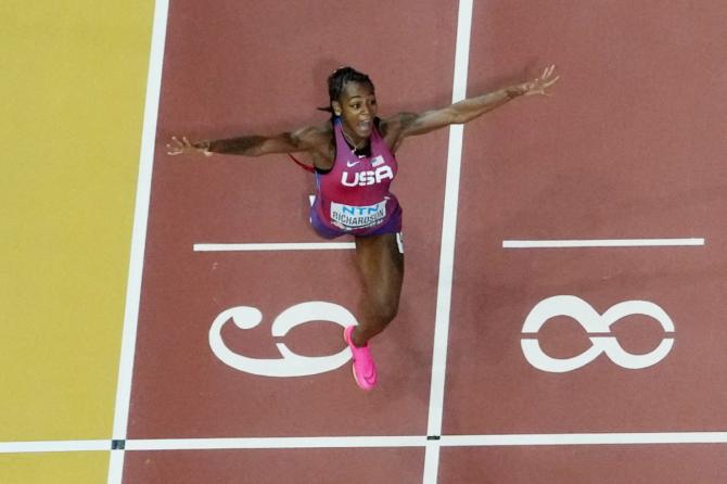 Sha'carri Richardson of the US crosses the line to win the women's 100m final of the World Athletics Championship at the National Athletics Centre, Budapest, Hungary, on Monday