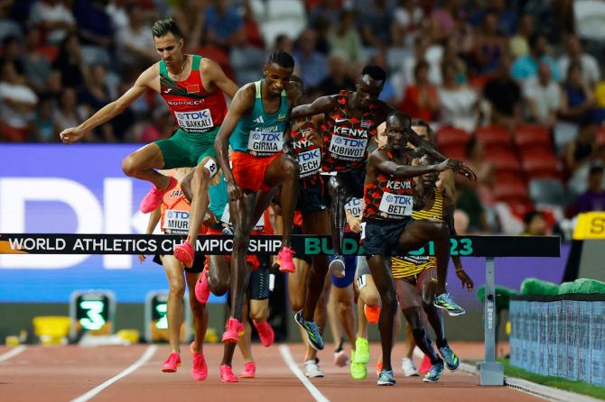 Morocco's Soufiane El Bakkali, Ethiopia's Lamecha Girma, Kenya's Abraham Kibiwot and Kenya's Leonard Kipkemoi Bett in action during the men's 3000m steeplechase final