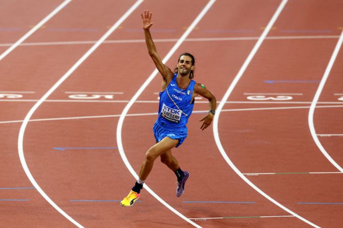 Gold medallist Italy's Gianmarco Tamberi celebrates after winning the Men's High Jump final