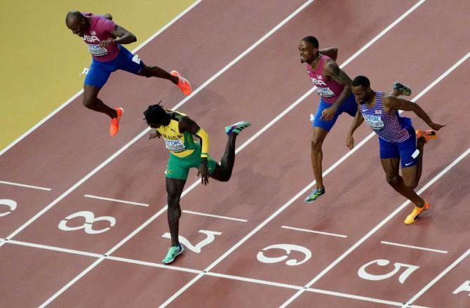 Jamaica's Antonio Watson crosses the line to win the men's 400m final on Thursday, August 24