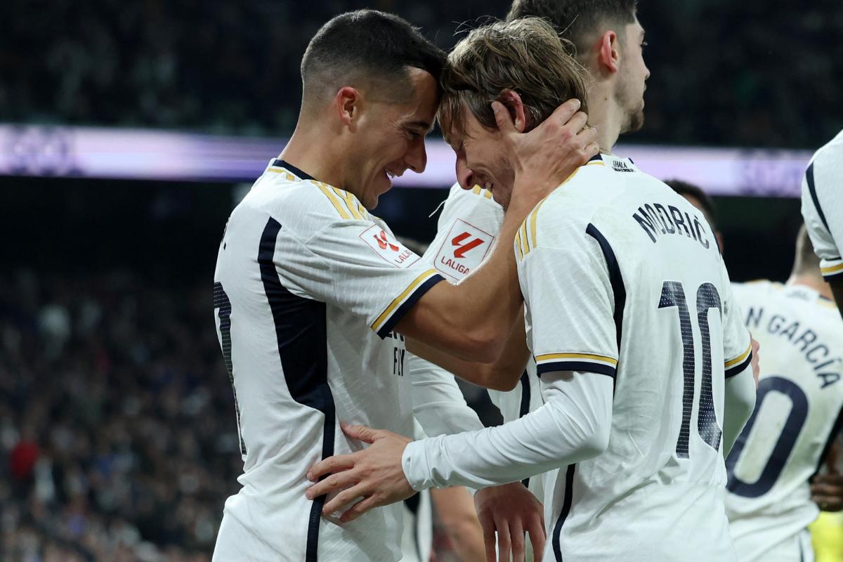 Real Madrid's Luka Modric celebrates scoring their fourth goal with Lucas Vazquez during their La Liga match at Santiago Bernabeu, Madrid, Spain