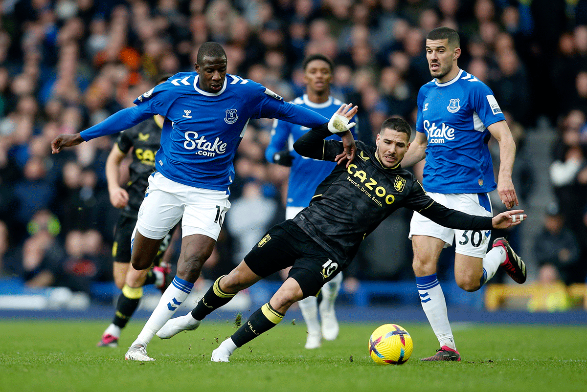 Everton's Abdoulaye Doucoure in action with Aston Villa's Emiliano Buendia 