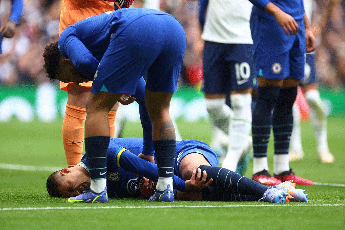 Chelsea's Thiago Silva reacts after sustaining an injury during their English Premier League match against Tottenham Hotspur on Sunday, February 26.