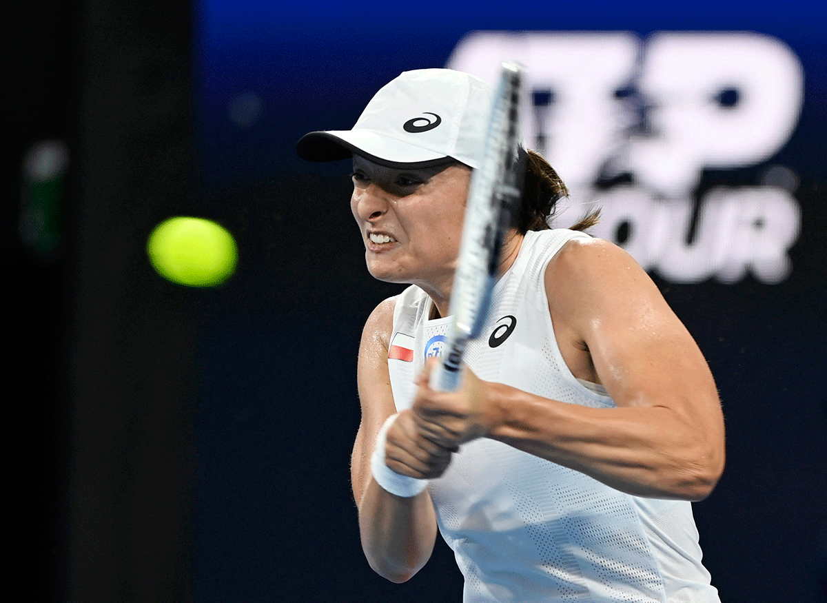 Poland's Iga Swiatek in action during her United Cup semi-final match against USA's Jessica Pegula 