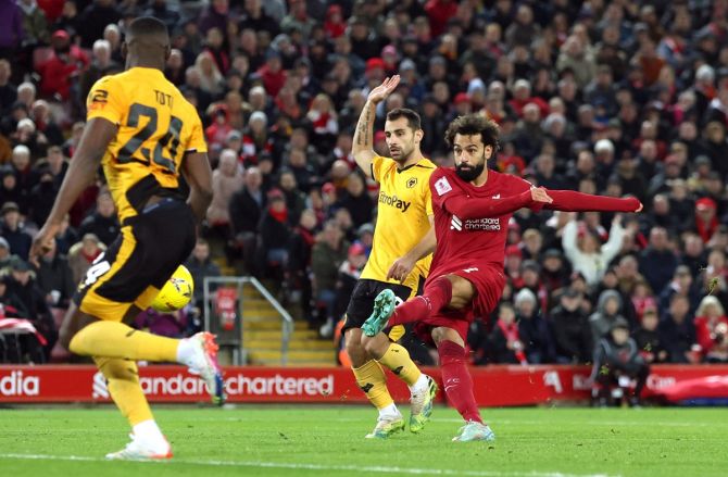 Mohamed Salah scores Liverpool's second goal during the FA Cup third round match against Wolverhampton Wanderers, at Anfield, Liverpool, on Saturday.