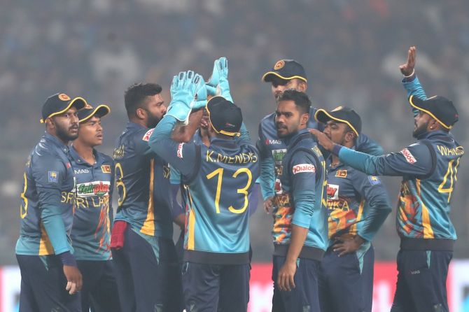 Sri Lanka's players celebrate the wicket of Virat Kohli during the second ODI at the Eden Gardens, in Kolkata, on Thursday.