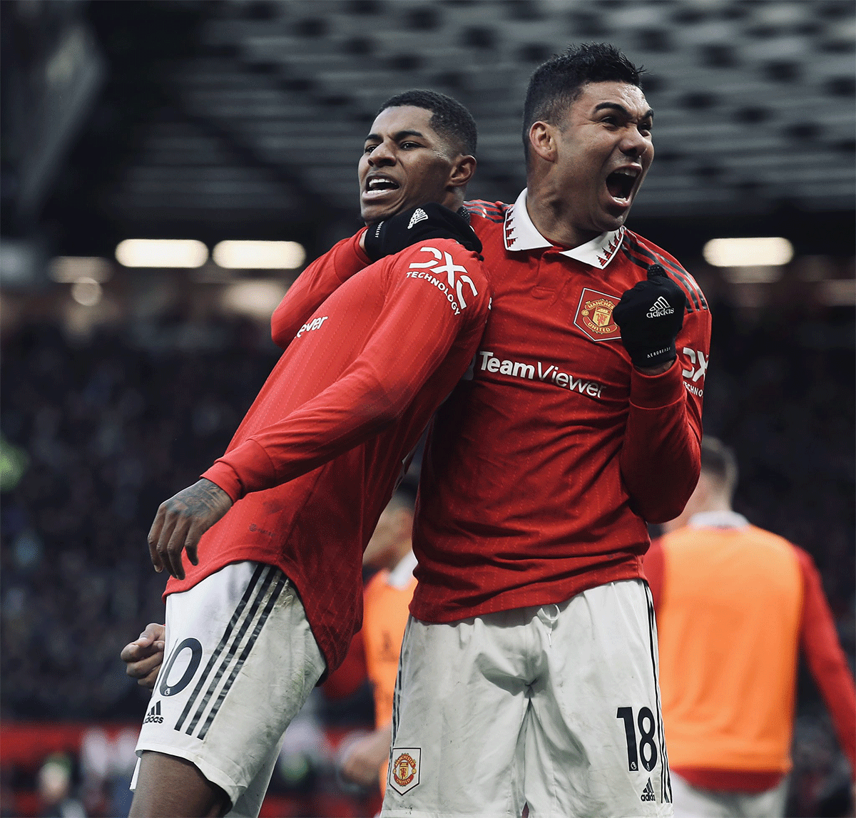 Manchester United's Marcus Rashford celebrates with Casemiro on scoring the winner against Manchester City on Saturday