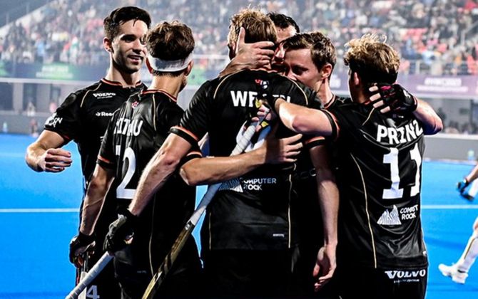 Germany’s players celebrate a goal against Belgium during the men’s hockey World Cup match in Bhubaneswar on Tuesday.