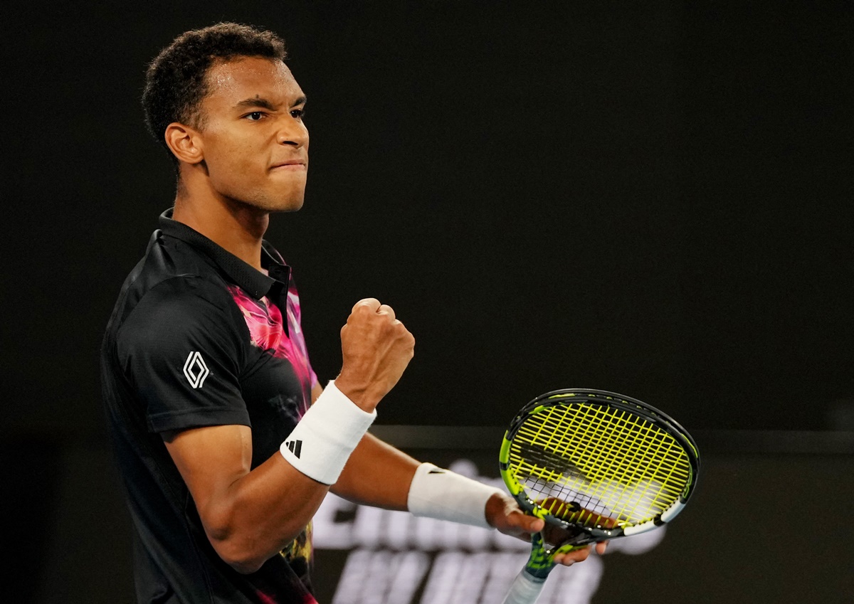 Canada's Felix Auger-Aliassime celebrates victory over Slovakia's Alex Molcan.