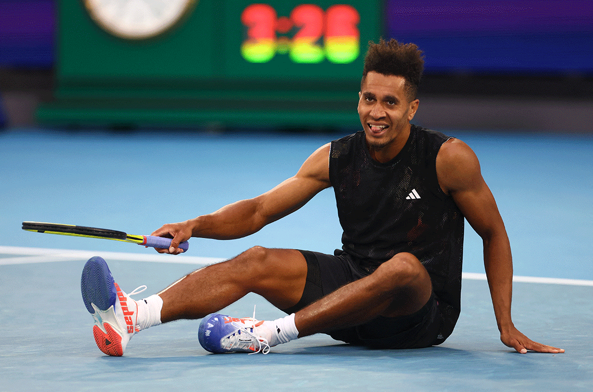 USA's Michael Mmoh celebrates winning his second round match against Germany's Alexander Zverev