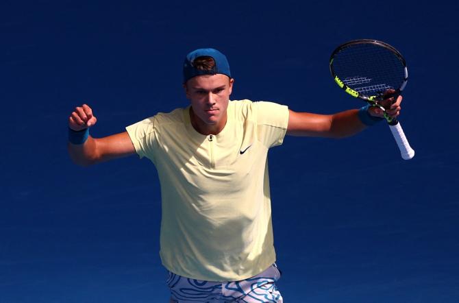 Denmark's Holger Rune celebrates winning his third round match against France's Ugo Humbert.