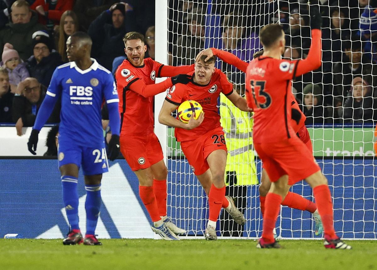 Evan Ferguson celebrates scoring Brighton & Hove Albion's second goal with Alexis Mac Allister against Leicester City, at King Power Stadium, Leicester.