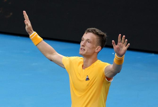 The Czech Republic's Jiri Lehecka celebrates winning his fourth round match against Canada's Felix Auger Aliassime at the Australian Open on Sunday.