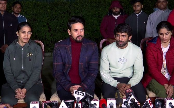 Thakur, along with wrestlers Bajrang Punia, Vinesh Phogat and Babita Phogat, addresses a joint-press conference on the wrestlers' protest against the Wrestling Federation of India and its chief Brij Bhushan Sharan Singh, at his residence, in New Delhi on Friday.