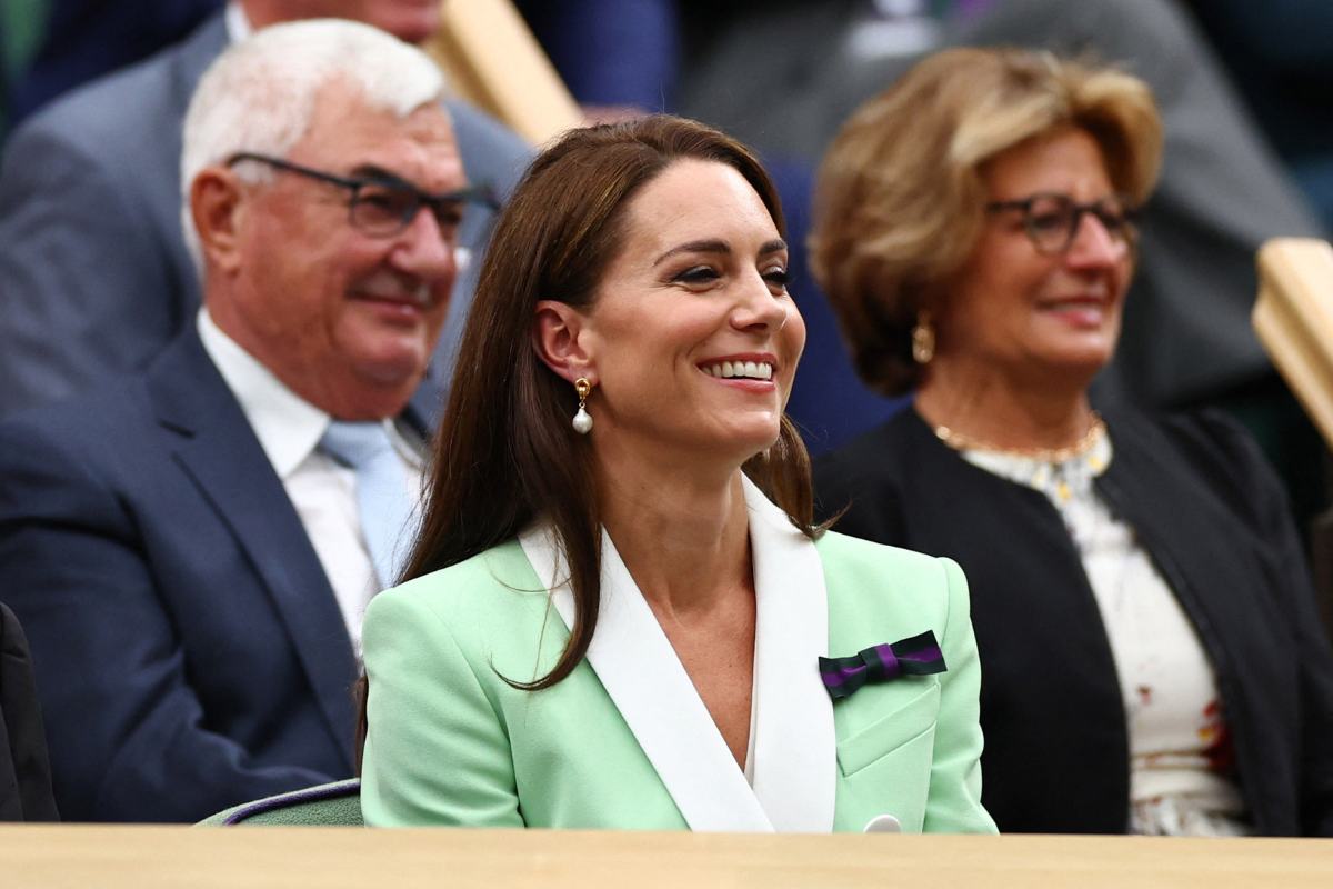 Catherine, Princess of Wales sits in the royal box on centre court