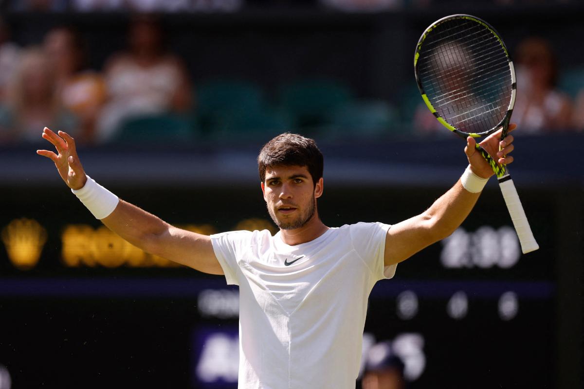 Spain’s Carlos Alcaraz celebrates winning his second round match against France’s Alexandre Muller