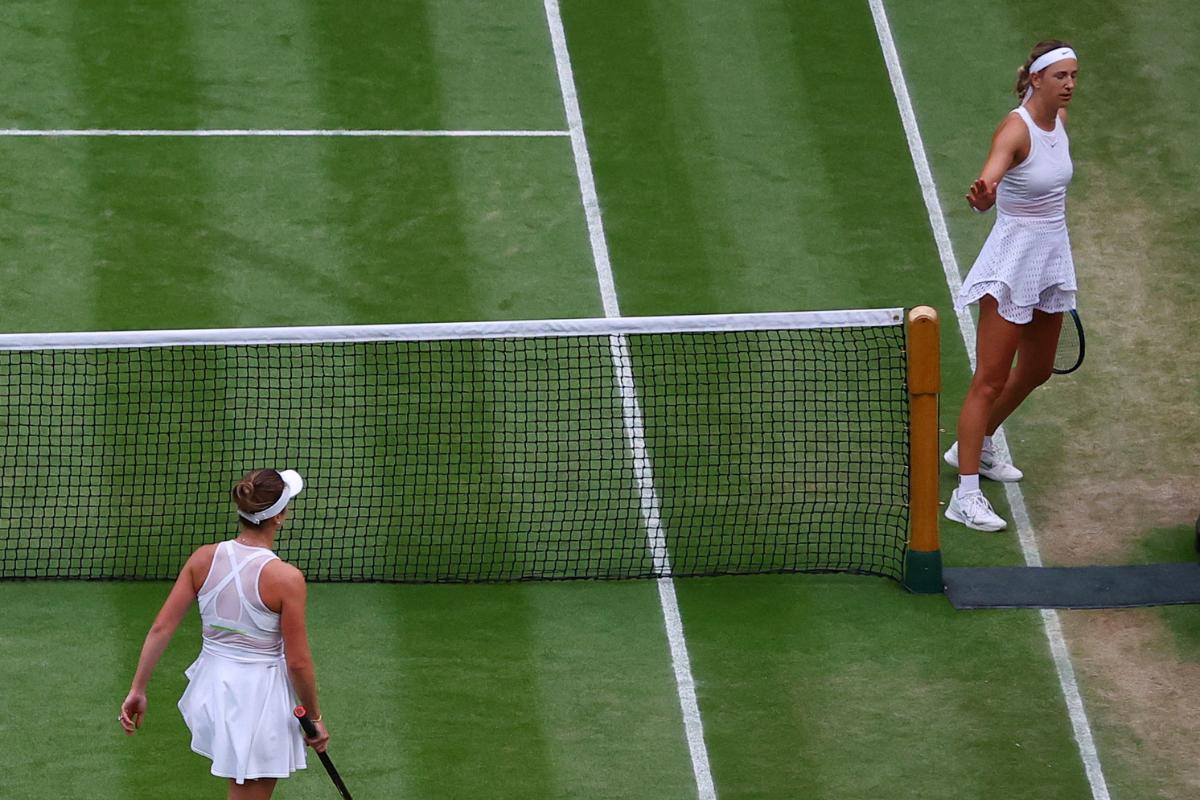 Belarus' Victoria Azarenka gestures towards Ukraine's Elina Svitolina refusing to shake her hand after losing her fourth round match  