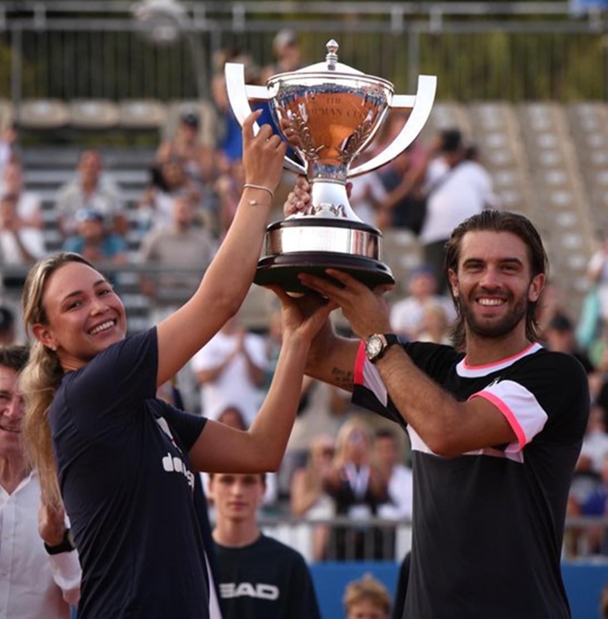 Borna Coric and Donna Vekic celebrate with the trophy after Croatia's victory over Switzerland in the Hopman Cup final in Nice on Sunday.