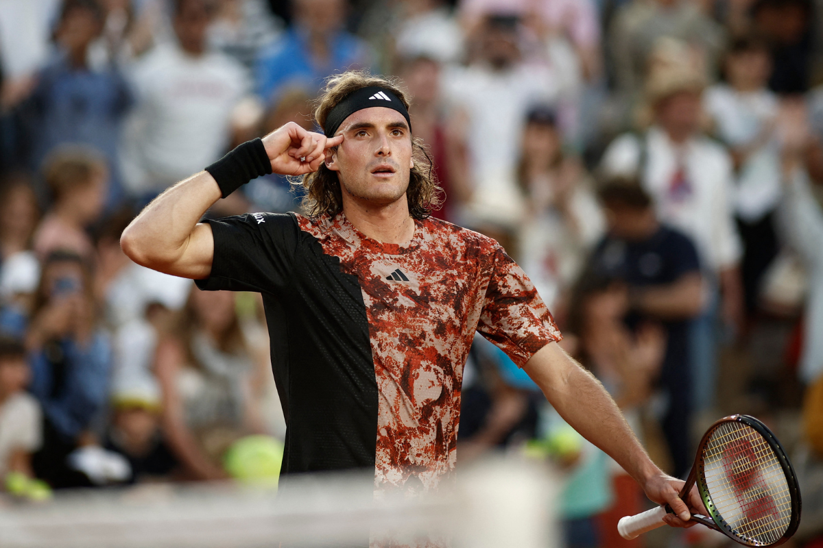 Greece's Stefanos Tsitsipas celebrates winning his fourth round match against Austria's Sebastian Ofner