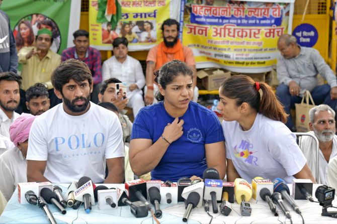 Wrestlers Vinesh Phogat, Sakshi Malik and Bajrang Punia protesting against Wrestling Federation of India (WFI) president Brij Bhushan Singh have denied that they have backed down from the protest, with Satyawart Kadian saying that reports of they stepping down from the protest are false and "neither have they compromised, nor will they step back".