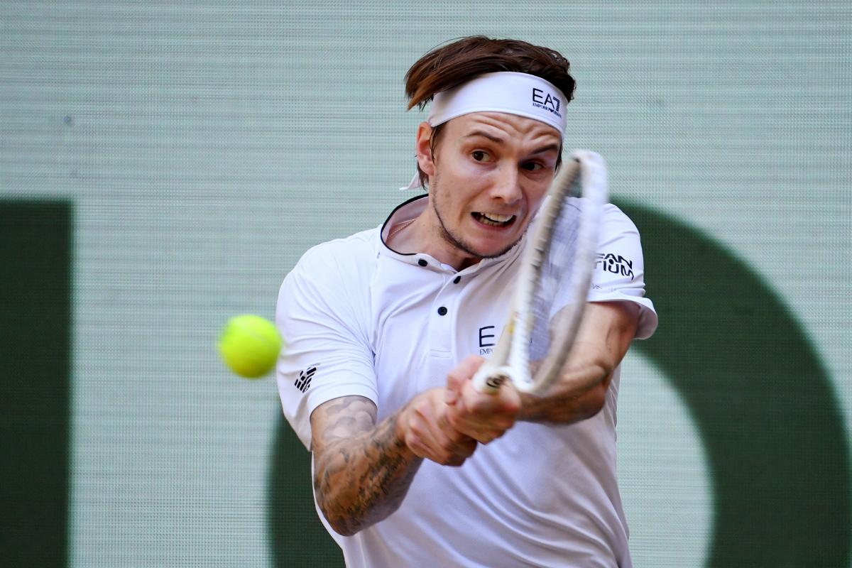 Kazakhstan's Alexander Bublik in action during the Halle Open final match against Russia's Andrey Rublev