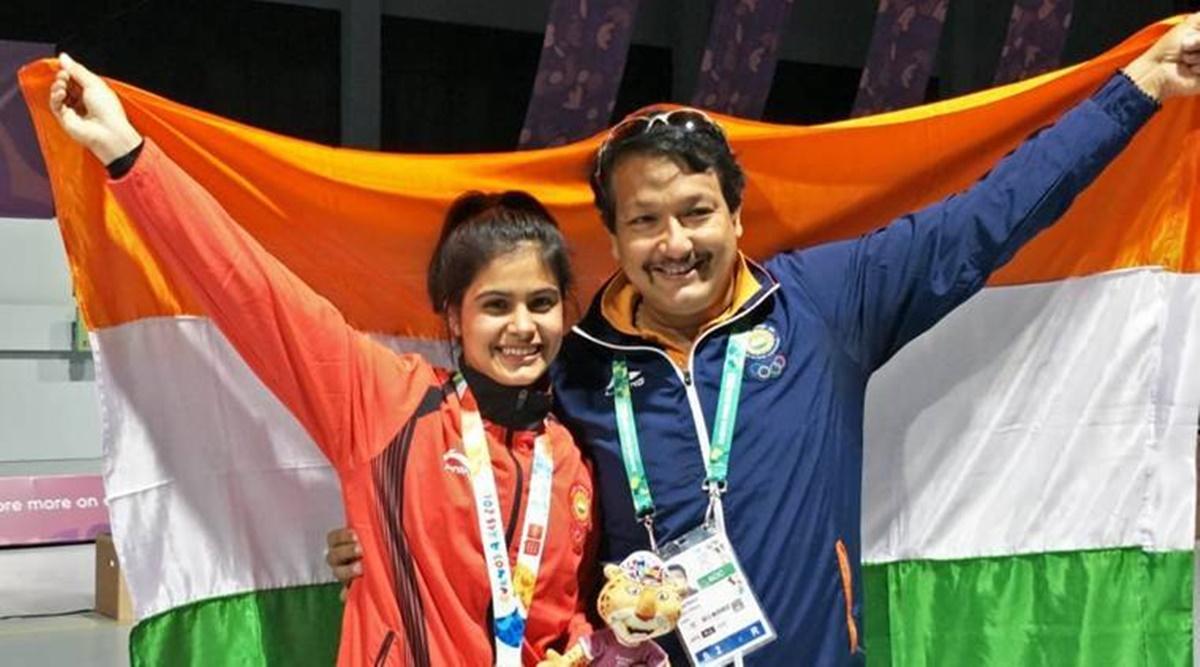 Jaspal Rana celebrates with Man Bhaker after her bronze medal win in the 10m Air Pistol