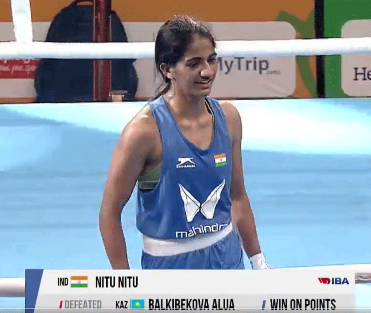 Nitu Ghanghas celebrates after winning her bout to reach the final of the 48kg category on Thursday.