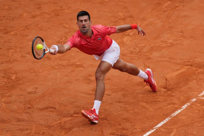 Serbia's Novak Djokovic in action during his round of 16 match against Britain's Cameron Norrie at the Italian Open in Foro Italico in Rome on Tuesday, May 16 