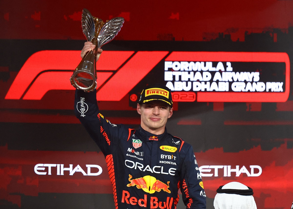 Red Bull's Max Verstappen celebrates with the trophy after winning the Formula One Abu Dhabi Grand Prix, at Yas Marina Circuit, Abu Dhabi, on Sunday.
