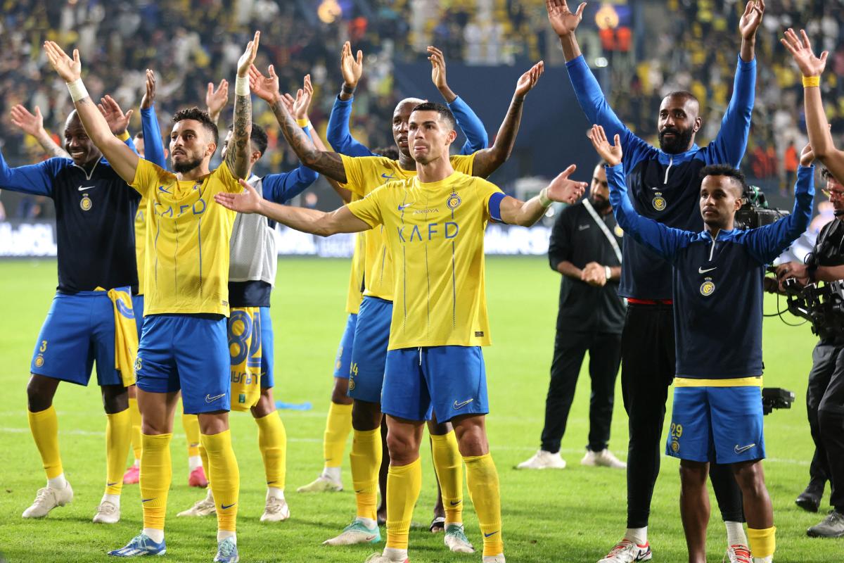 Al Nassr's Cristiano Ronaldo and teammates applaud fans