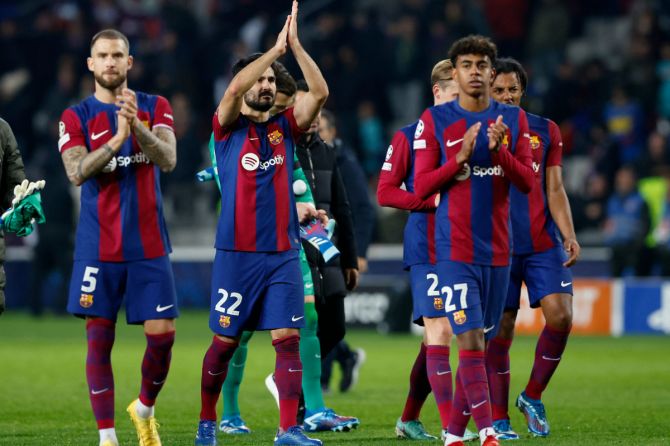 FC Barcelona's Lamine Yamal celebrates after their Group H  match against FC Porto at Estadi Olimpic Lluis Companys, Barcelona