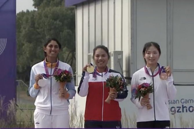 Aditi Ashok on the podium at the Asian Games in Hangzhou on Sunday