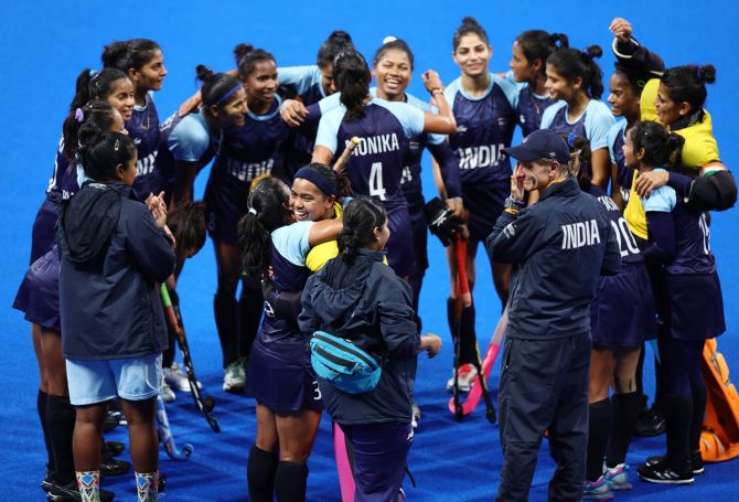 Indian women's team celebrate after winning the bronze