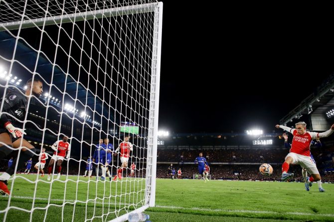 Leandro Trossard scores Arsenal's second goal. 