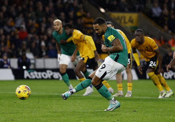 Callum Wilson scores Newcastle United's second goal against Wolverhampton Wanderers from the penalty spot.
