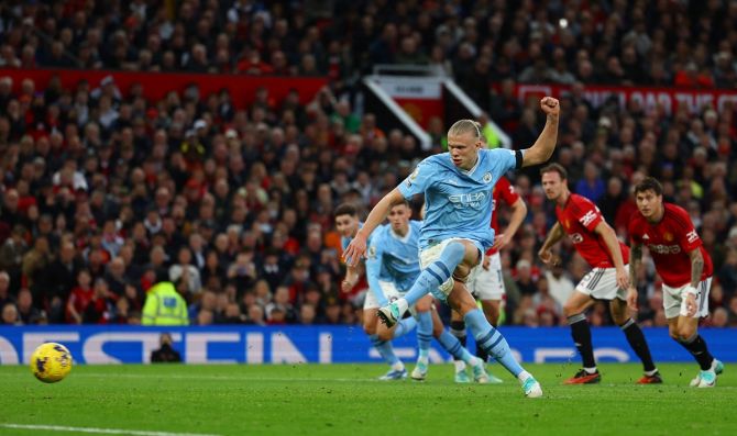 Erling Braut Haaland scores Manchester City's first goal from the penalty spot.