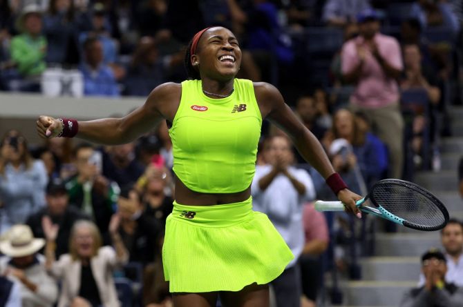 Coco Gauff of the United States exults after winning her US Open third round match against Belgium's Elise Mertens at Flushing Meadows, New York, in Friday.