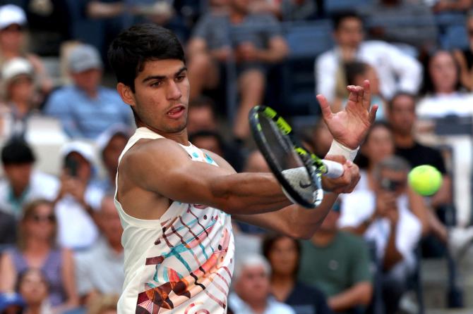 Spain's Carlos Alcaraz in action during his third round match against Britain's Daniel Evans