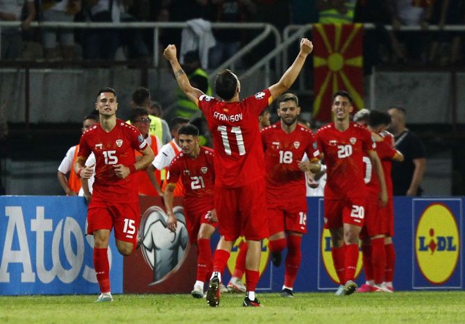 North Macedonia's players celebrate after Enis Bardhi scores during the Euro 2024 Group C qualifier against Italy at Tose Proeski Arena, Skopje, North Macedonia.