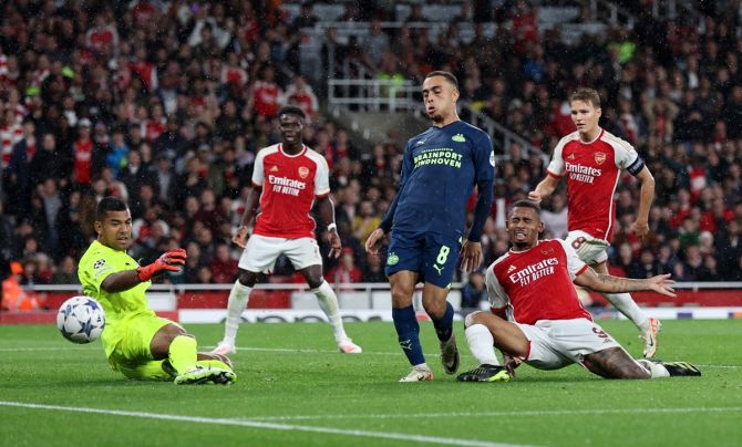 Arsenal's Gabriel Jesus (on ground) makes an unsuccessful attempt to score during the Group B match against PSV Eindhoven at Emirates Stadium, London.