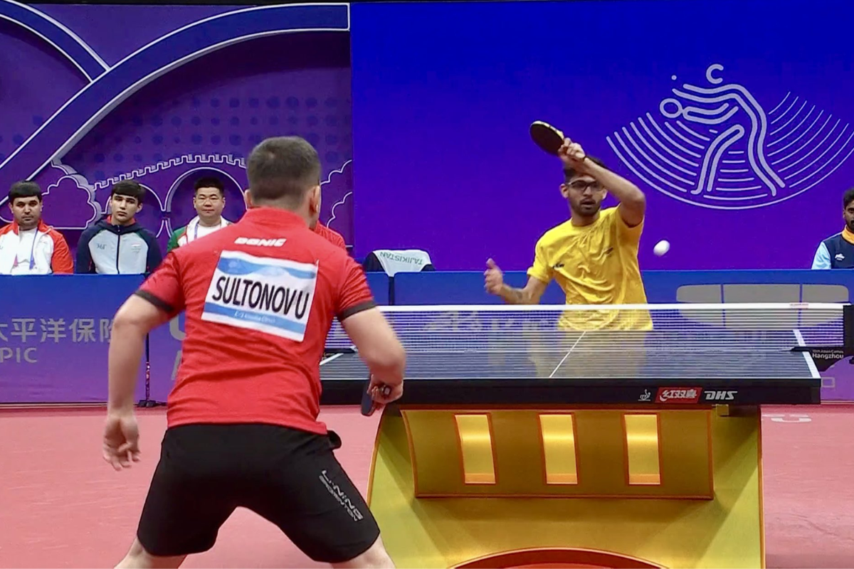 India's Manus Shah had to battle hard against Ubadullo Sultonov in the 2nd match of the men's team Table Tennis Group F tie at the Asian Games on Saturday