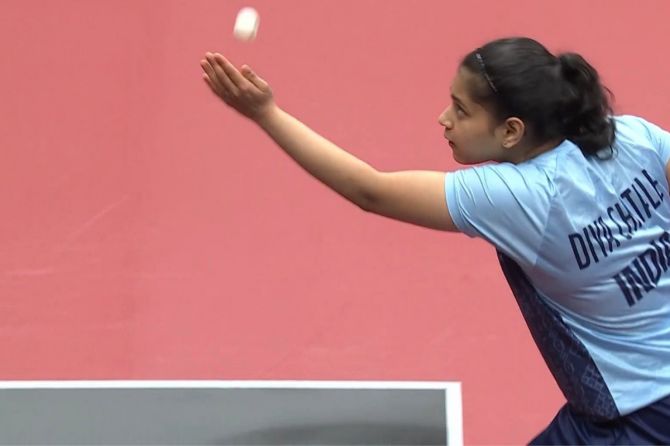Diya Chitale put India in the front with a straight game win to put the women's team on the front foot against Singapore in their Group game at the Asian Games on Saturday
