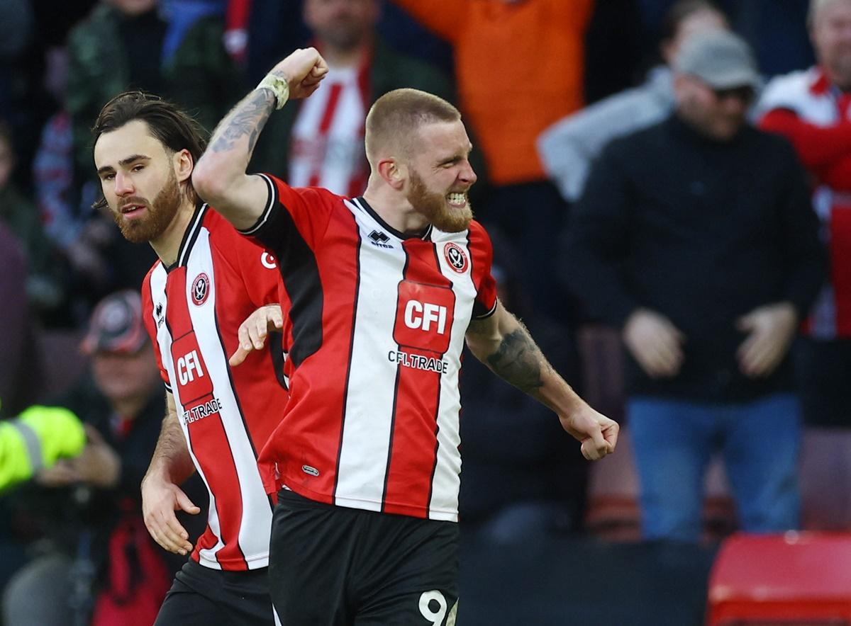 Oli McBurnie celebrates scoring Sheffield United's second goal against Chelsea at Bramall Lane, Sheffield.