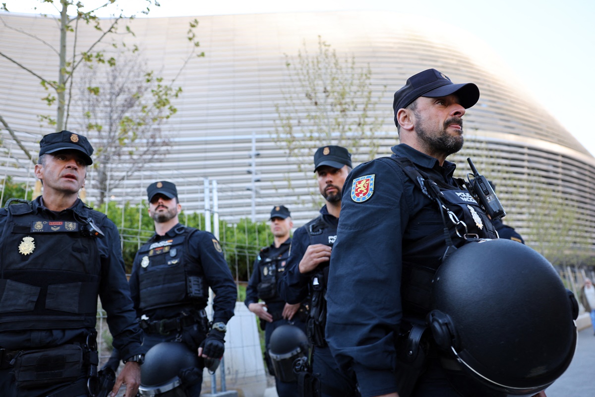 Police is seen outside the stadium ahead of the Champions League quarter-final first leg between Real Madrid and Manchester City, at the Santiago Bernabeu, in Madrid, Spain, on Tuesday, April 9, 2024.