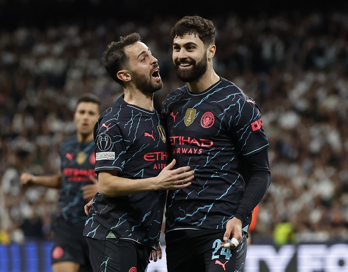 Josko Gvardiol celebrates scoring Manchester City's third goal with Bernardo Silva