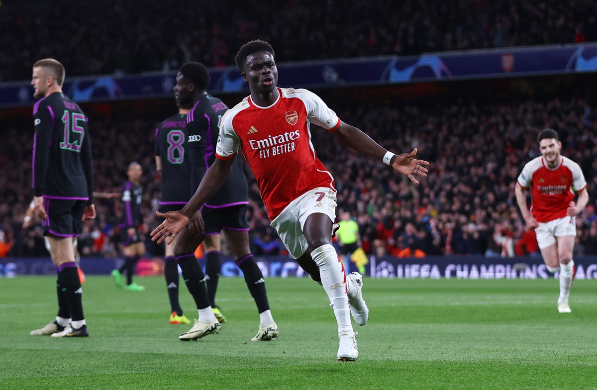 Bukayo Saka celebrates scoring Arsenal's opening goal.