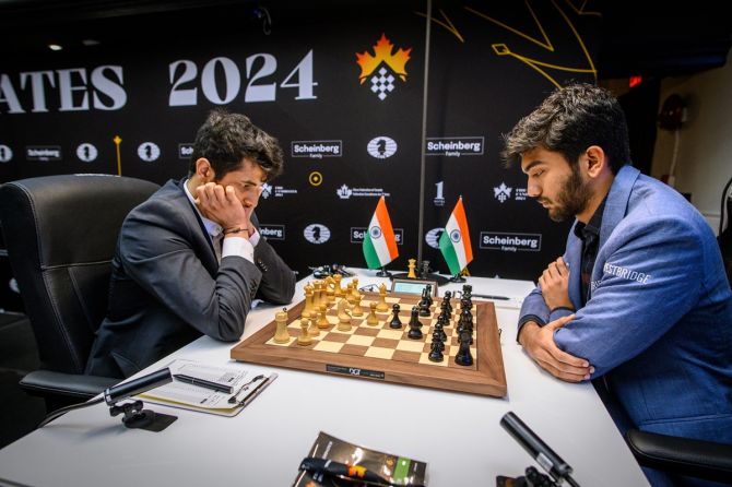 Vidit Gujrathi and D Gukesh during their eighth round match in the Candidates chess tournament in Toronto on Friday.