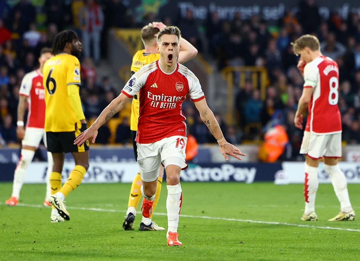 Leandro Trossard celebrates scoring Arsenal's first goal against Wolverhampton Wanderers at Molineux Stadium, Wolverhampton.