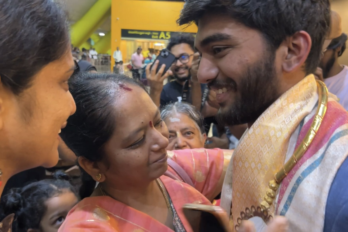 D Gukesh gets a hug from his mother Padma on his arrival at Chennai airport on Thursday